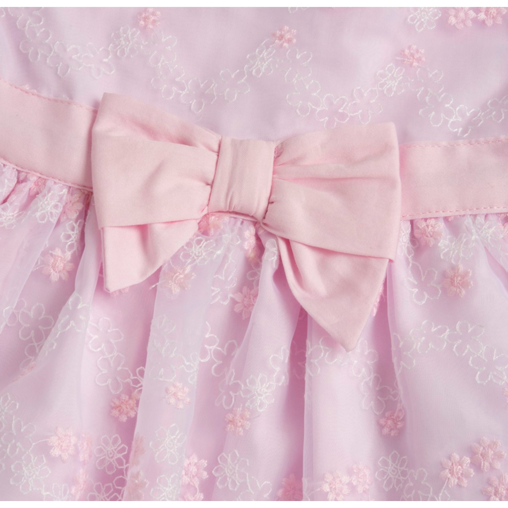 Chicco Babykleid in Rosa mit floralem Muster, kurzen Ärmeln und großer Schleife in der Taille, festlich und elegant für Babys