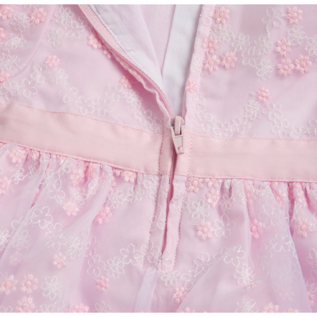 Chicco Babykleid in Rosa mit floralem Muster, kurzen Ärmeln und großer Schleife in der Taille, festlich und elegant für Babys